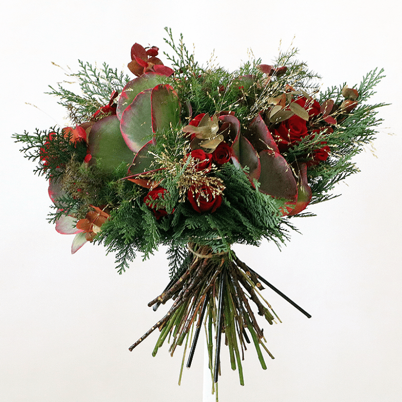 festive bouquet of succulents and berries with mixed bouquet