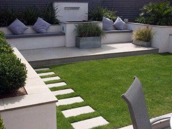 landscaped patio area with seating