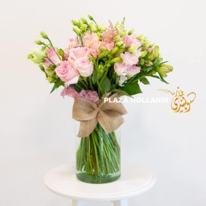 Pink flower bouquet in a glass vase