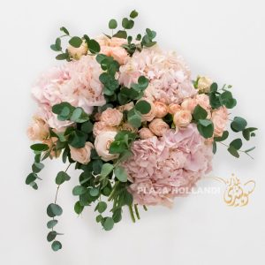 Pink hydrangea bouquet with spray roses