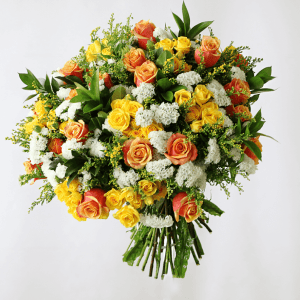 yellow, orange, and white bouquet of roses and spray roses and statice