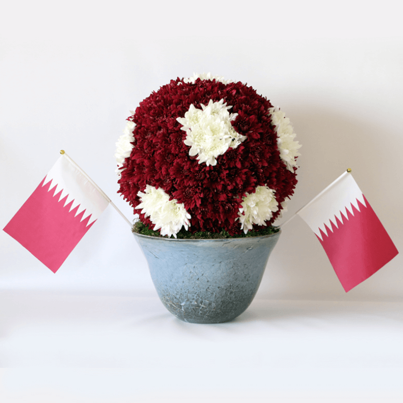 Qatar football in vase