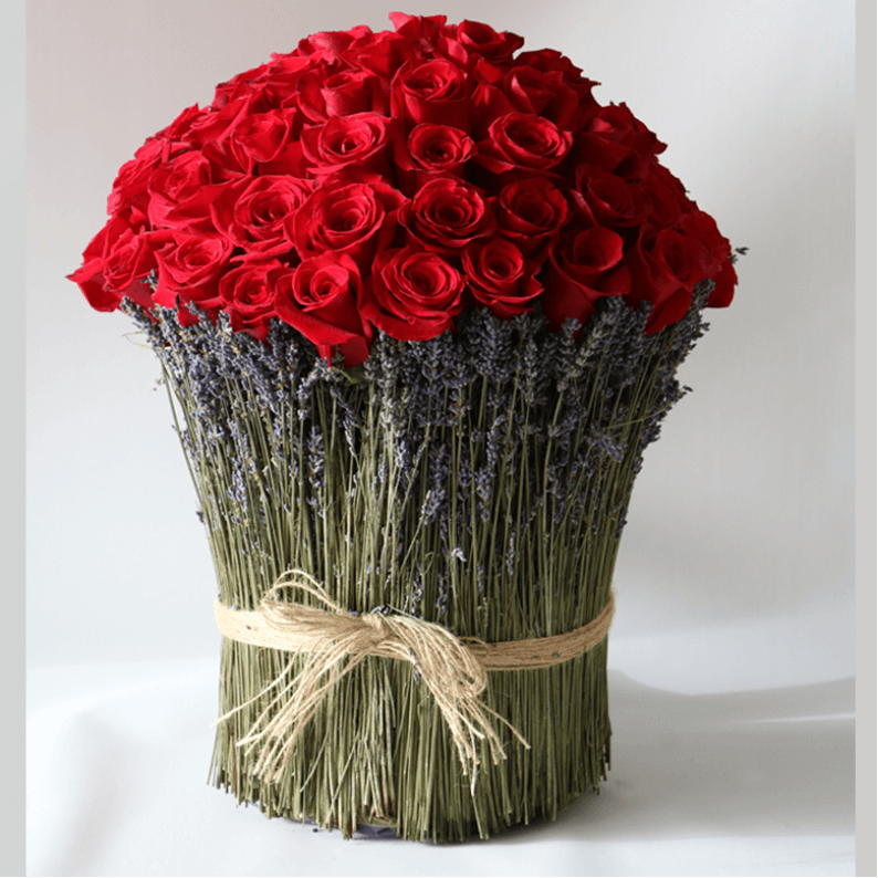 red rose bouquet surrounded by lavender