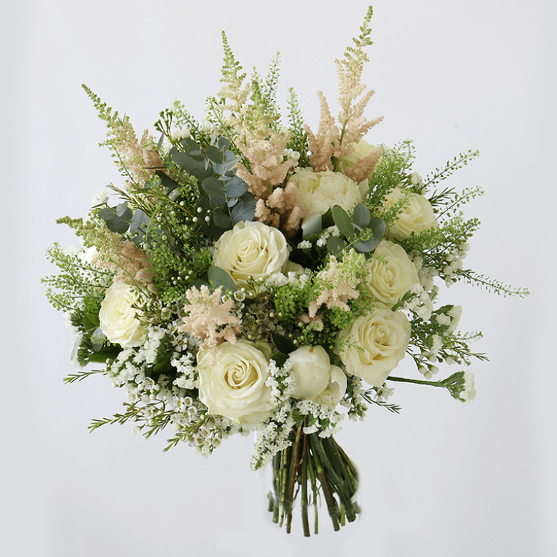 Light pink astilbe, white roses, white peonies, wax flower with green leaves