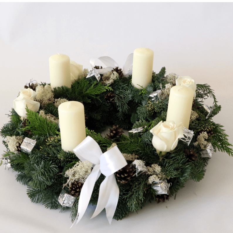 wreath arrangement with white candles