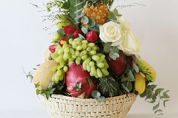 fruit basket with flowers and fruit