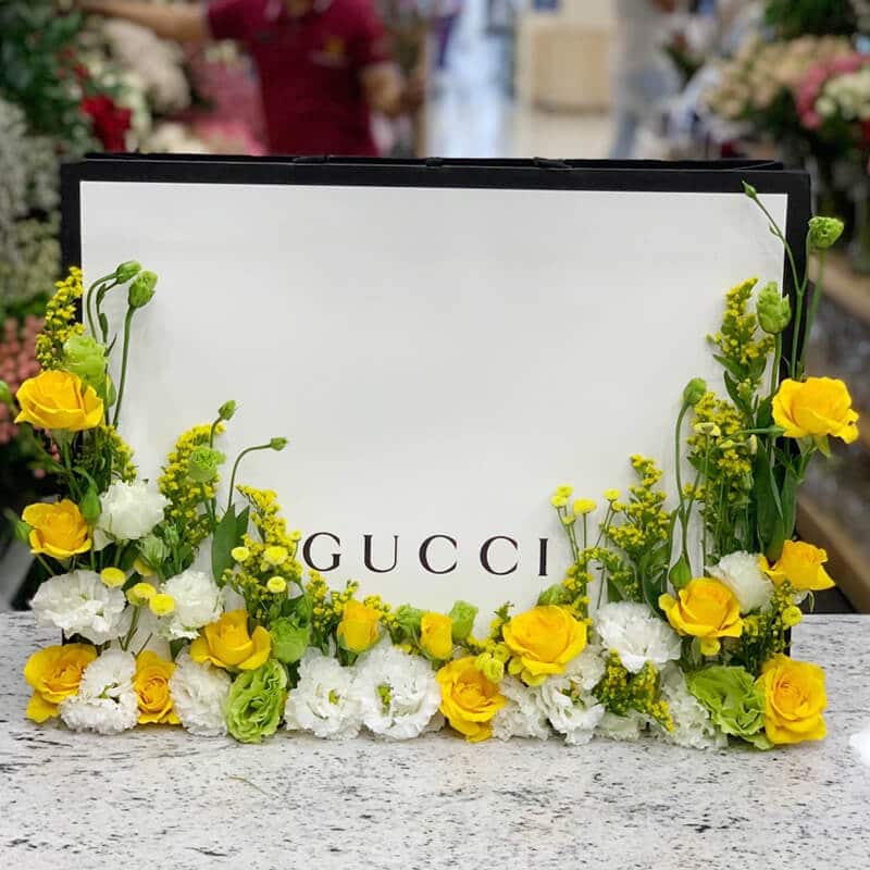 Customised Orders Flowers 5 Gucci bag with yellow roses and white eustoma