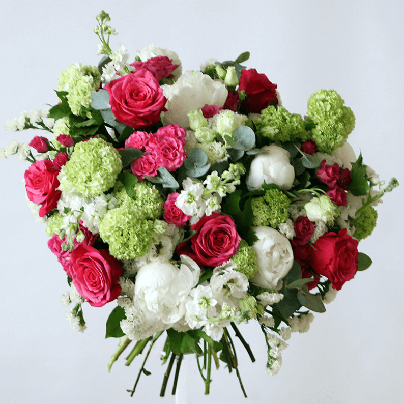 Jodie 8 fuchia pink roses, white peonies and viburnum and stock bouquet