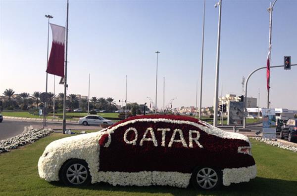 Qatar National Day 2 Car covered in flowers for national day