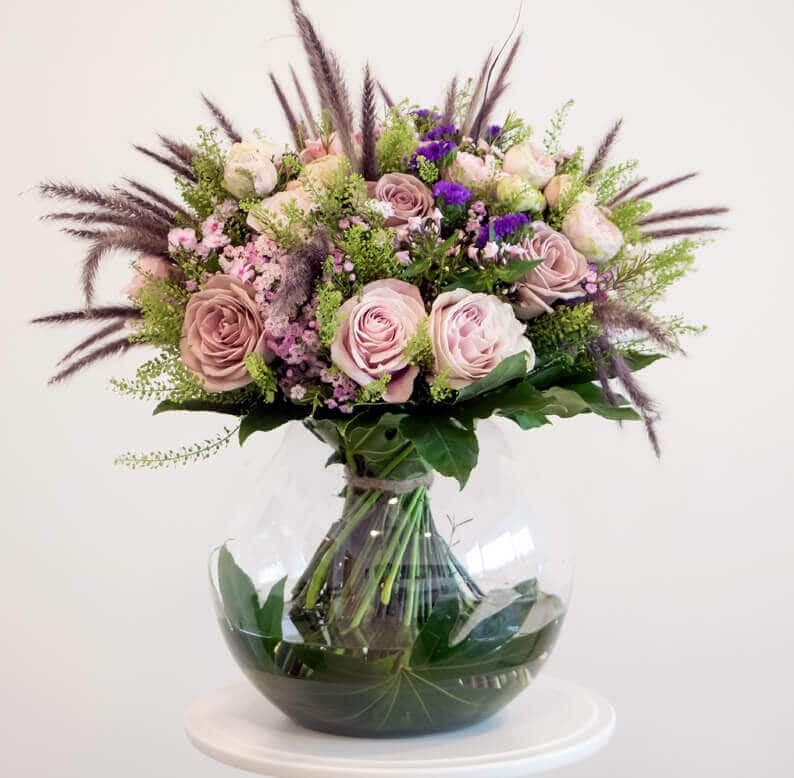 Pink and green bouquet in a vase