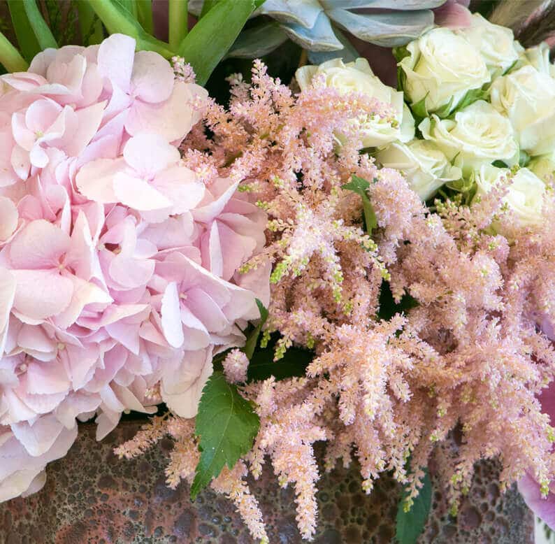 Close up of pink and flower arrangement