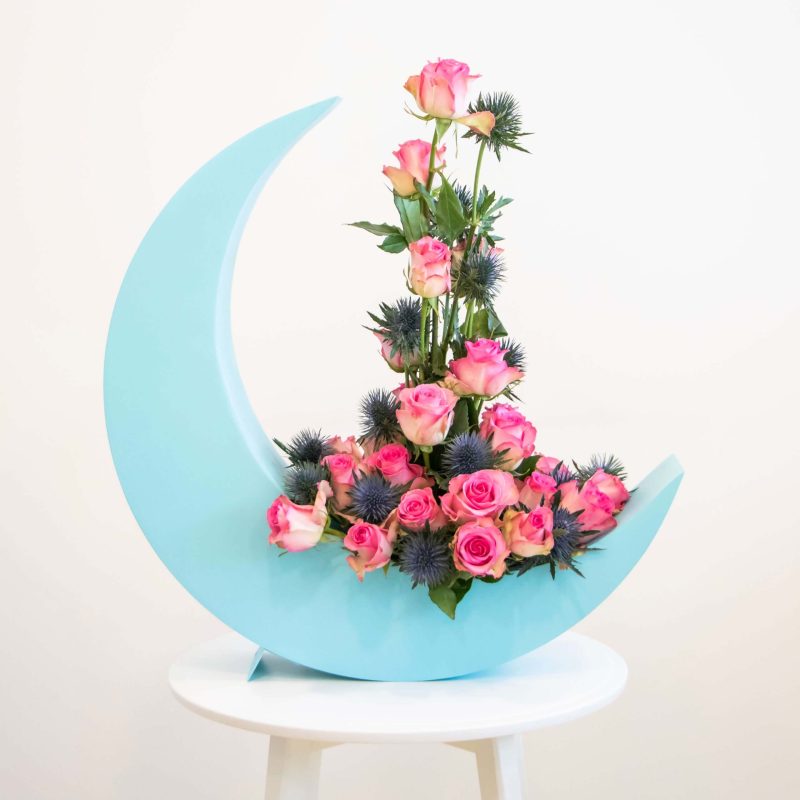 Crescent moon with pink flowers