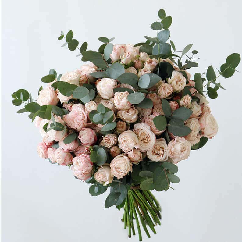 bouquet peach/pink spray roses mixed with eucalyptus