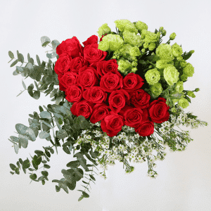 Red roses, green eustoma and eucalyptus in a bouquet