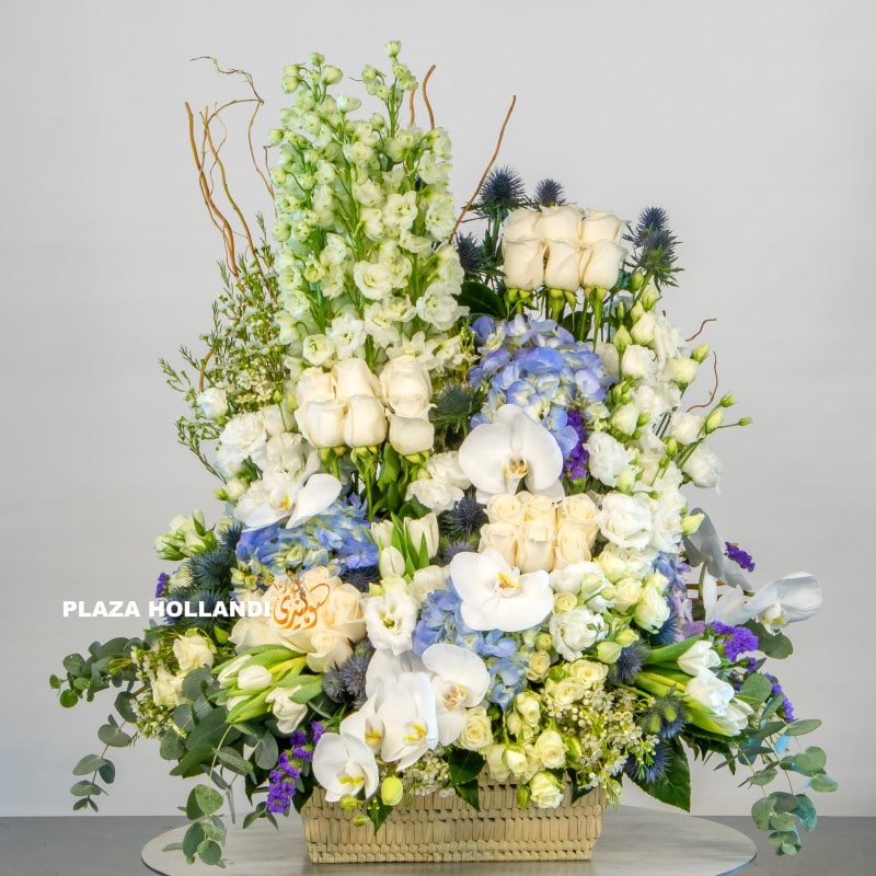 Blue, white and cream flower arrangement