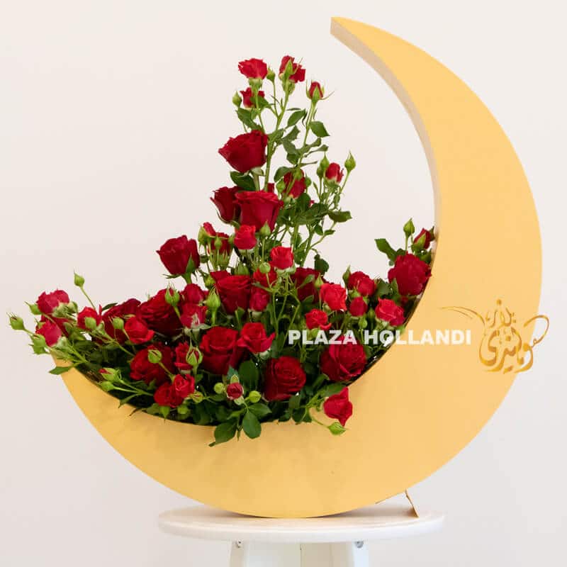 Tanisha Crescent Moon 8 Red roses, spray roses in a gold crescent moon