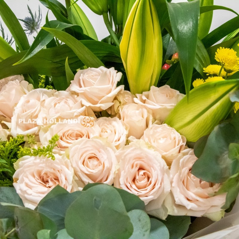 close up of roses and lily flowers