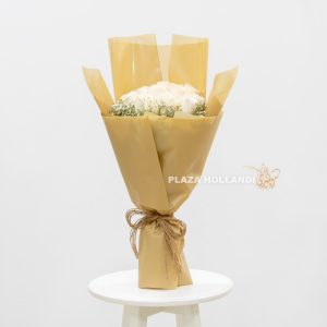 White rose flower bouquet with wrapping
