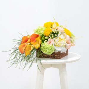 yellow, orange and white flower arrangement