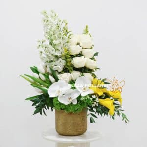Large gold pot filled with white & yellow flowers