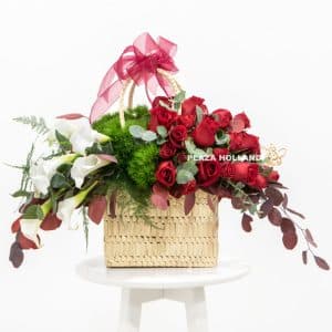 Basket arrangement with pink and white flowers
