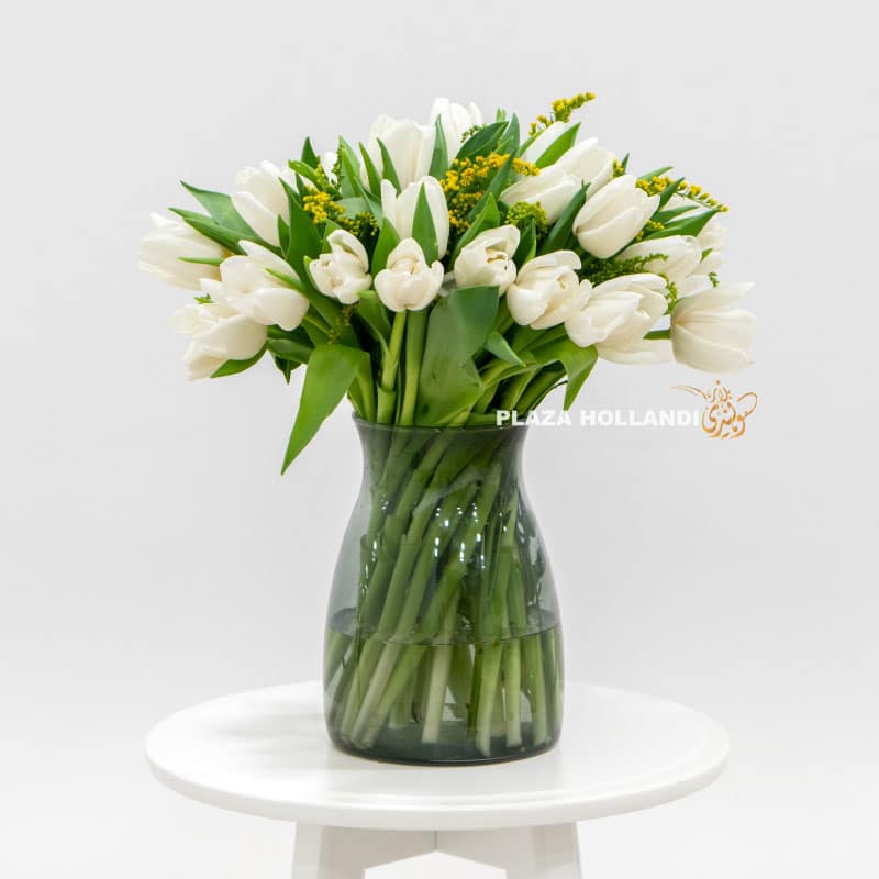 White Tulip bouquet in a glass vase