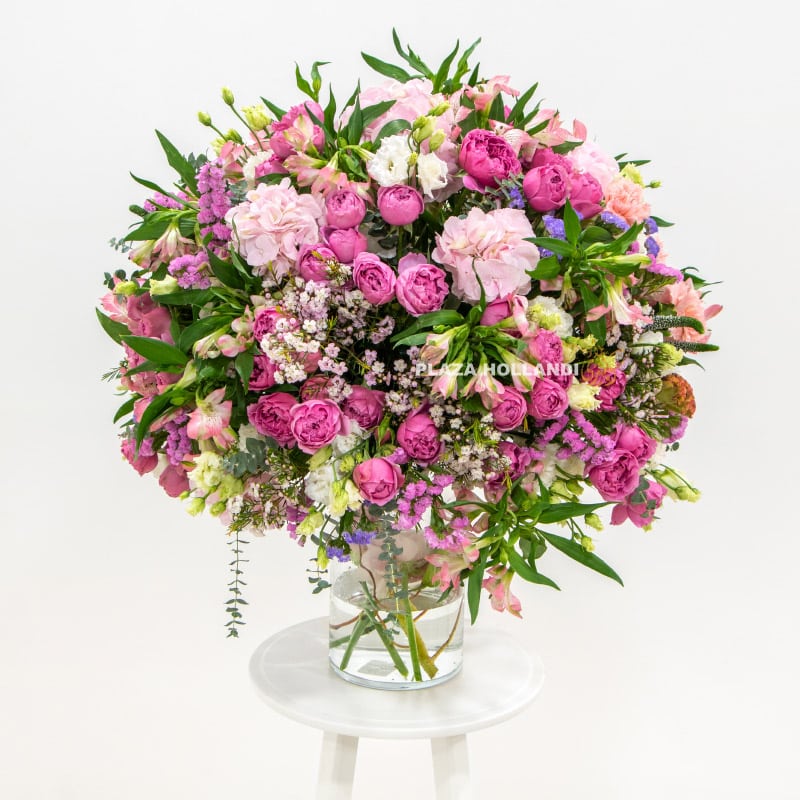 pink flower arrangement in a glass vase