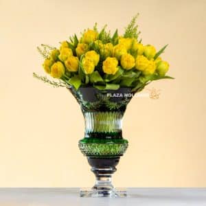 Crystal vase with yellow tulips