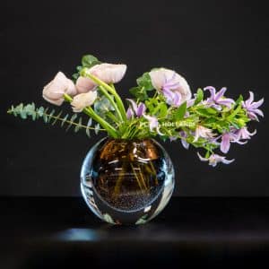Dutz crystal vase with ranunculus and clematis