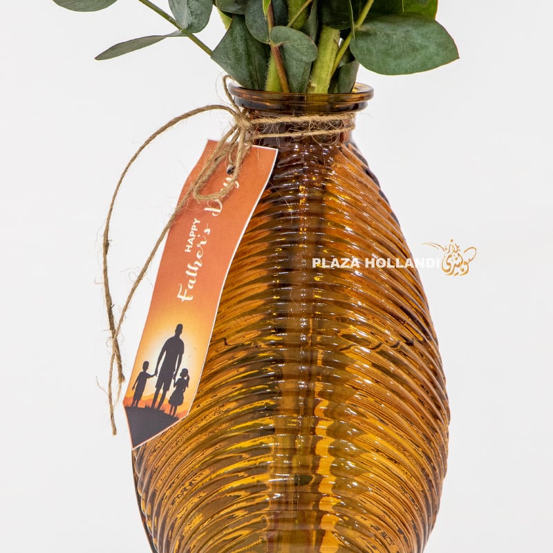 close up of vase with fathers day card
