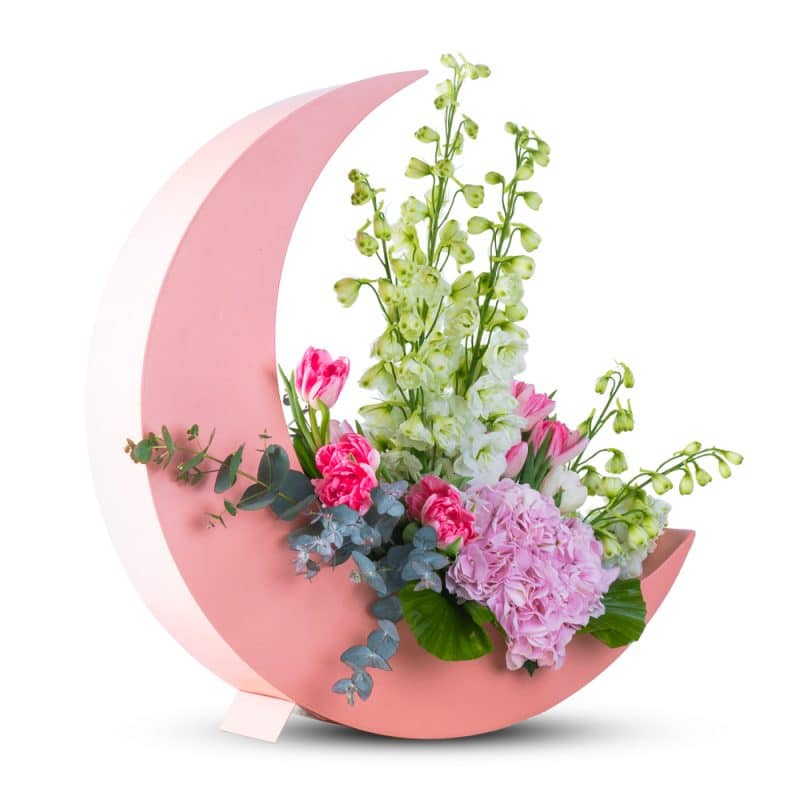 Flower Arrangement in a Pink Half Moon