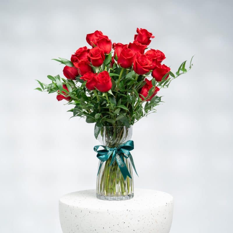 Luxurious Red Roses & Italian Ruscus in Glass Vase (H 45 cm)