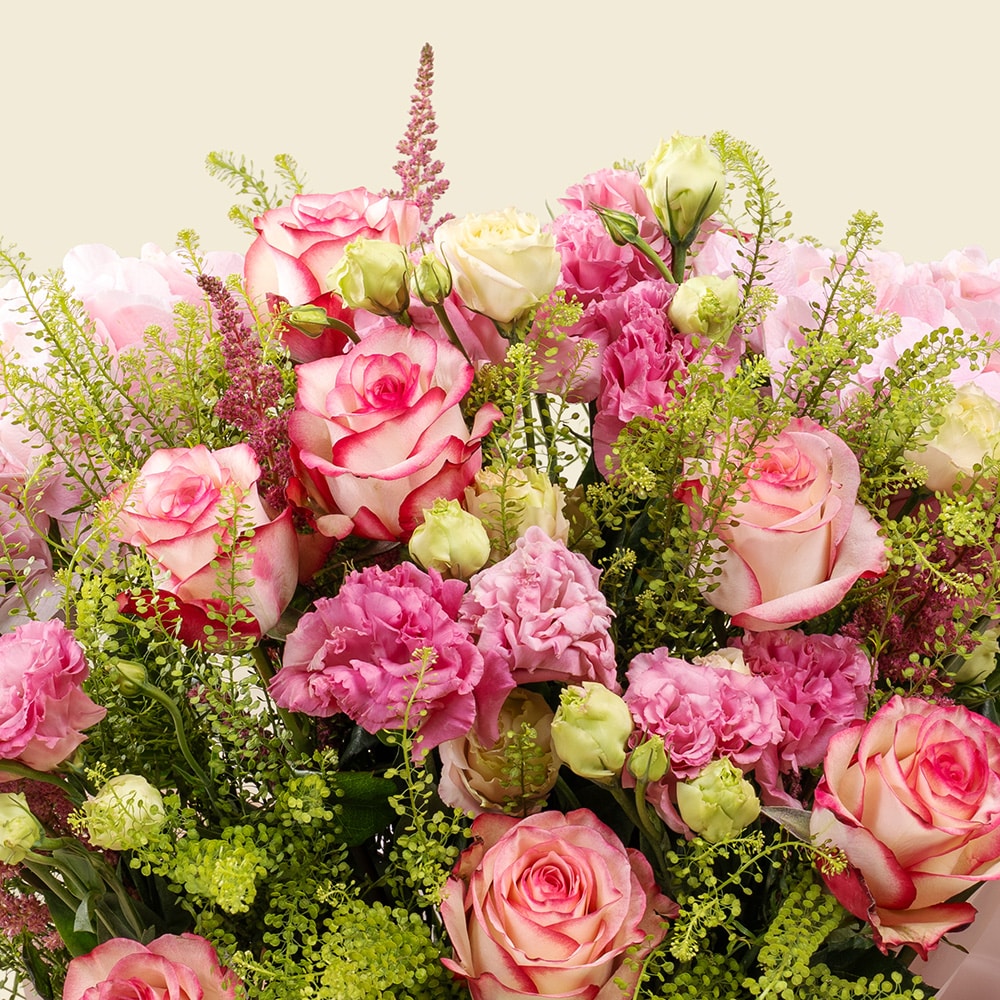 Celebrate Eid Al-Adha 7 Blush Pink Roses Bouquet with Eustoma, Carnations & Green Bell