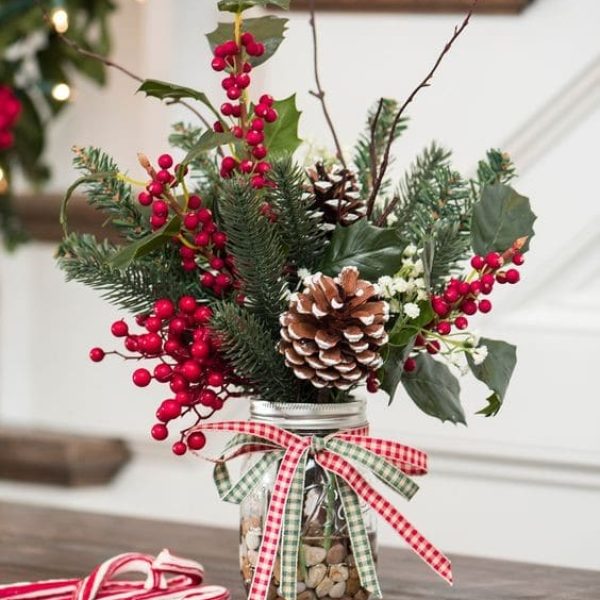 Mason jar with flowers Christmas mason jar filled with foliage